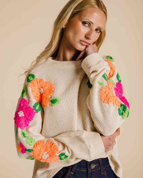 Blusa de moletom com flores bordadas
