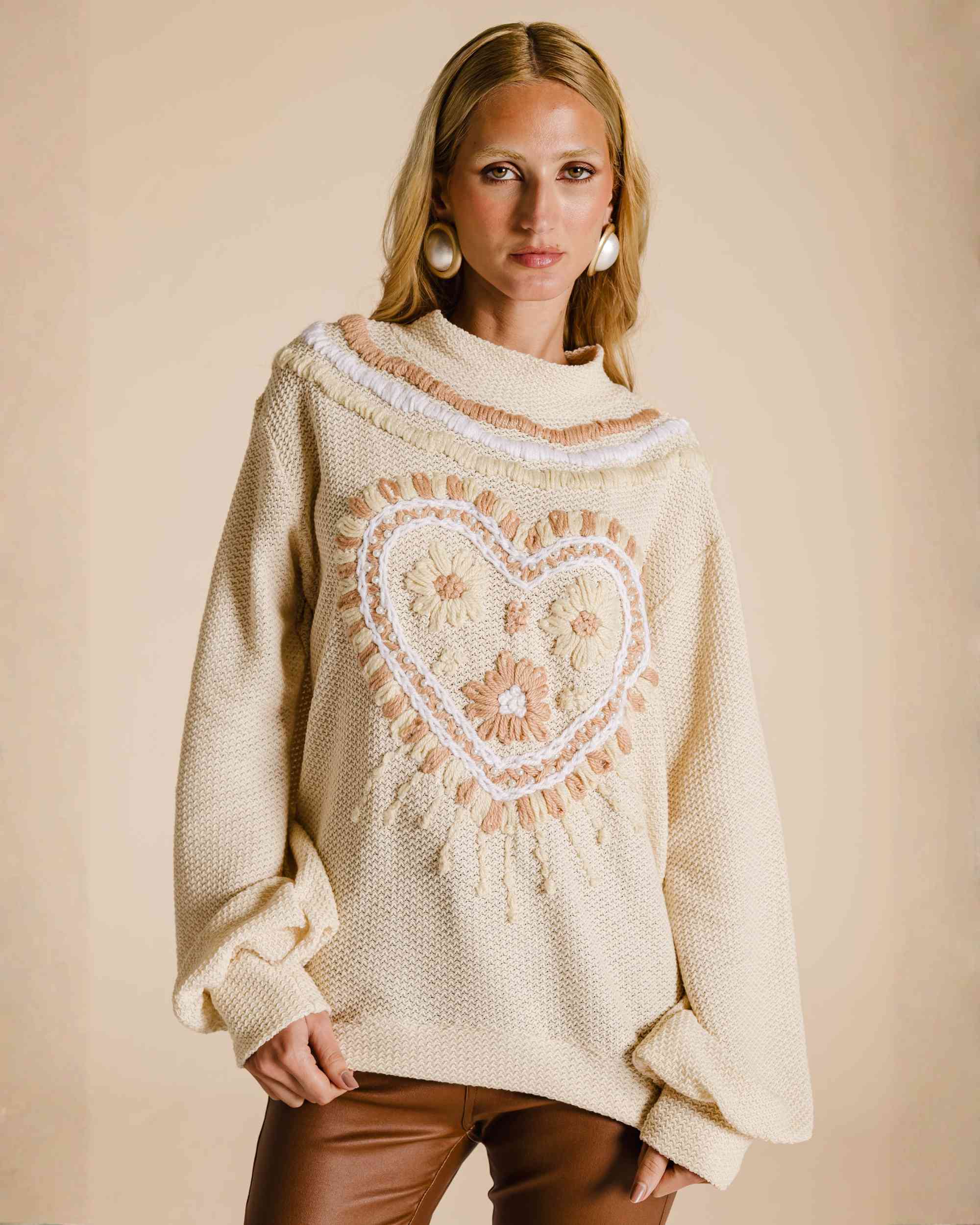 Blusa de moletom coração texturizado
